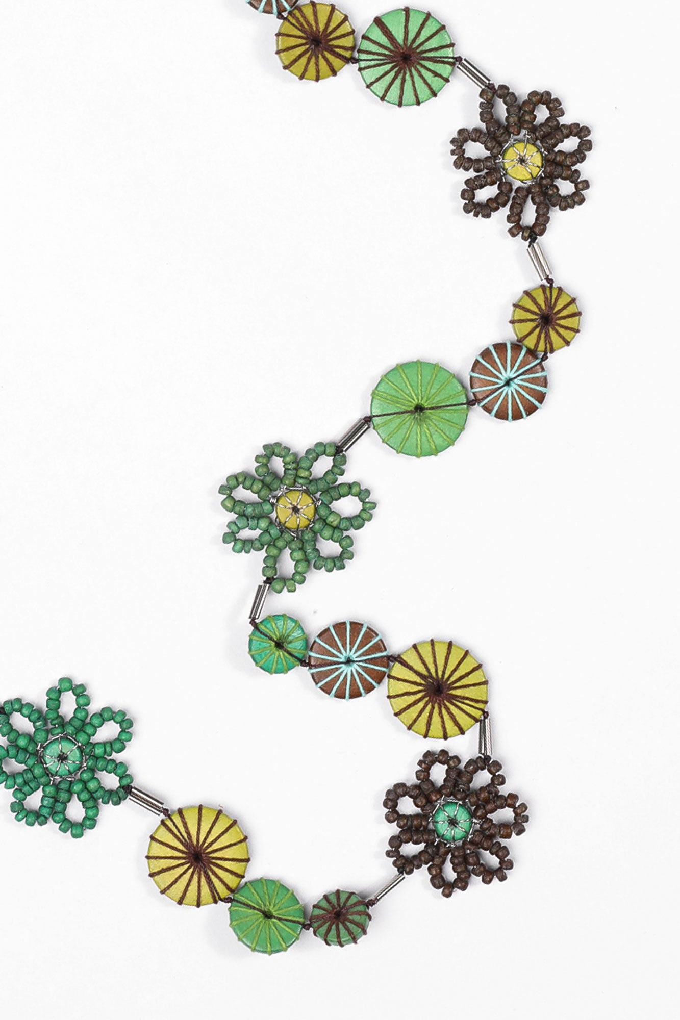 FLOWER AND STITCHED DISC NECKLACE